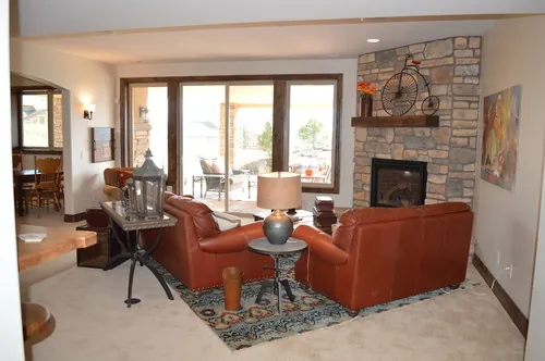 Collina custom home — Lower Level Living Room Fireplace Window Wall 07