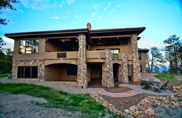 Monitor Rock custom home — Rear Elevation Angle