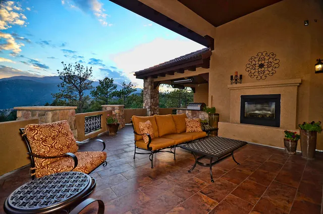 Monitor Rock custom home — Rear Elevation Patio Daytime Angle