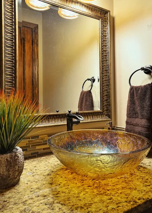 Reserve Point custom home — Powder Room Custom Vanity Sink 08