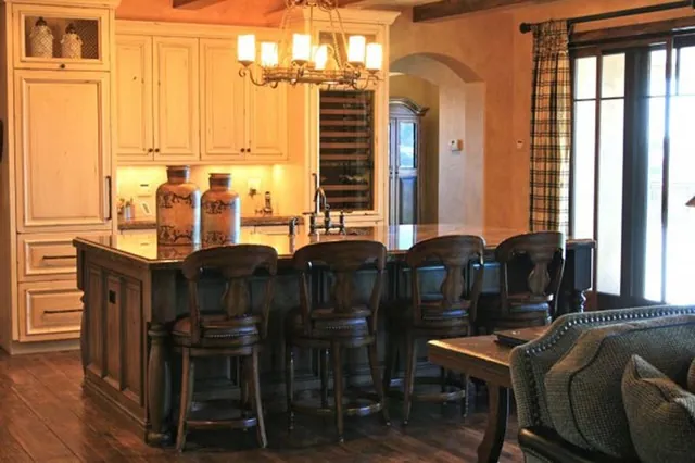 Tuscan Villa custom home — Dry Bar Wine Cabinet Room